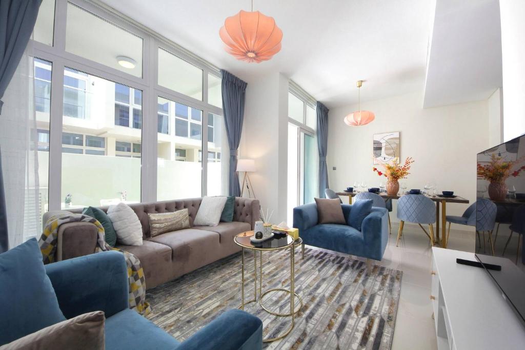 Furnished three-bedroom apartment living room freshly cleaned and arranged by home deep cleaning services in Dubai, creating a cozy and inviting home environment.