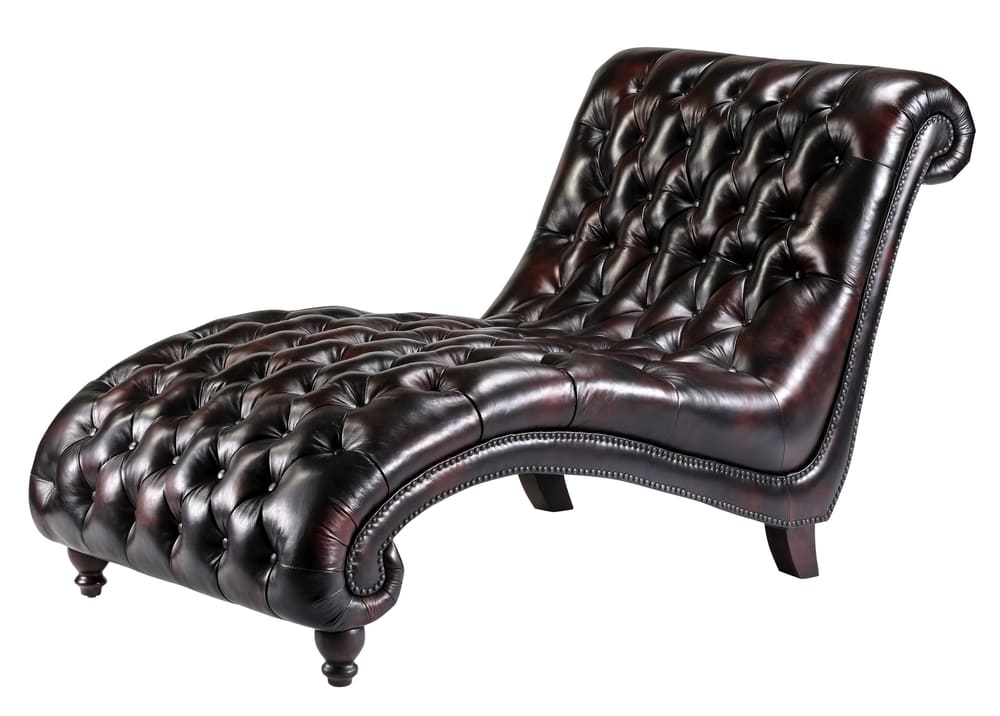 Luxury leather chaise lounge with tufted design, ideal for specialized furniture cleaning services as part of sofa deep cleaning in Dubai.