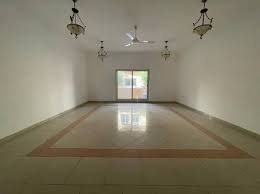 The clean and spacious 2BHK unfurnished villa has ample sunlight, showcasing a profound cleaning transformation in Dubai.