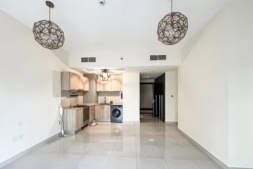 Compact and clean studio apartment, emphasizing the profound cleaning transformation of an unfurnished living space in Dubai.